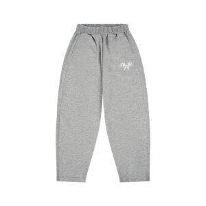 The Kid's ORIGINALS Essential II Wide Leg Sweatpants by Don Dimi Collective are made for children who need comfort, movement, and easy everyday style with a relaxed wide-leg shape. Made from 47.5% cotton, 45% polyester, and 7.5% spandex with a moderate 7.7 oz/yd² fabric weight, these mid-waist sweatpants give a regular loose fit with an elastic waist, cotton blend softness, and flexible stretch for school, running, outdoor play, sports, spring outfits, autumn outfits, and daily casual wear. DDC Fashion is a Haitian Heritage brand under Don Dimi Collective, built as a home for artists worldwide to collaborate, grow, and earn through their passion and art. These kids' wide leg sweatpants carry that mission in a comfortable, practical form, connecting youth style, movement, school life, sport, and creative culture. Gender: Neutral Fabric: 47.5% cotton, 45% polyester, 7.5% spandex Fabric Weight: 7.7 oz/yd², 260 g/m² Fabric Thickness: Moderate Fit: Regular, loose Waist: Mid waist Waistband: Elastic waist Style: Basics, casual, preppy, sporty, daily casual Use: Outdoor, running, school, sport, spring, autumn Pant Style: Wide leg sweatpants Care Instructions: Machine wash at 30°C on gentle cycle. Do not bleach. Tumble dry low. Iron at low temperature and avoid ironing on the print. Do not dry clean. Kid's ORIGINALS Essential II Wide Leg Sweatpants, Don Dimi Collective kids sweatpants, DDC Fashion kids sweatpants, Haitian Heritage brand, neutral kids sweatpants, wide leg kids sweatpants, cotton blend kids sweatpants, spandex kids sweatpants, elastic waist kids pants, loose fit kids sweatpants, mid waist kids sweatpants, school sweatpants for kids, outdoor kids sweatpants, running kids sweatpants, sporty kids pants, spring kids sweatpants, autumn kids sweatpants, Haitian streetwear brand, artist streetwear brand