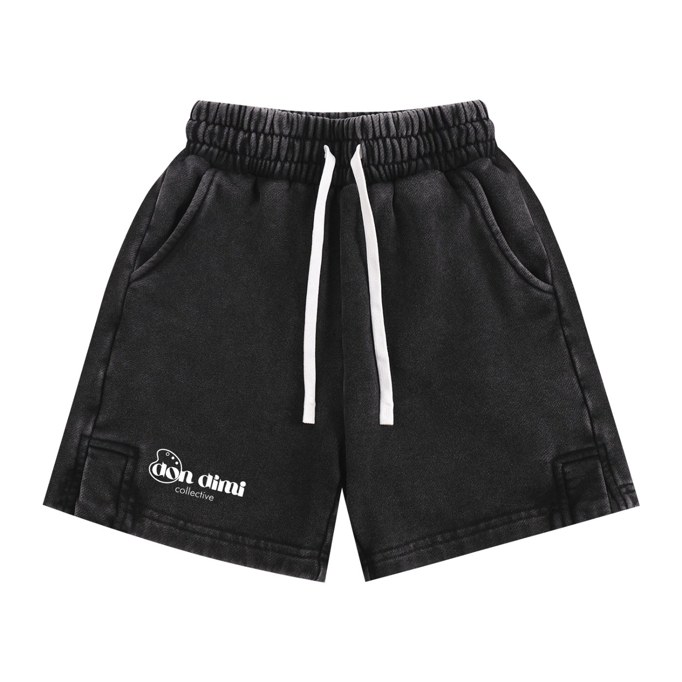 The Kids' ORIGINALS Essential II Washed Fabric Shorts by Don Dimi Collective are made for children who need comfortable cotton shorts with a soft washed look, regular fit, and easy everyday movement. Made from 100% cotton with a moderate 8.6 oz/yd² fabric weight, these non-stretch mid-waist shorts give kids a clean casual shape for summer, spring, school, home, holidays, outdoor play, sports, and daily streetwear styling. DDC Fashion is a Haitian Heritage brand under Don Dimi Collective, built as a home for artists worldwide to collaborate, grow, and earn through their passion and art. These kids' washed fabric shorts carry that mission in a simple, practical form, connecting comfort, youth style, school life, sport, movement, and creative culture. Gender: Neutral Fabric: 100% cotton Fabric Weight: 8.6 oz/yd², 290 g/m² Fabric Thickness: Moderate Fabric Stretch: Non-stretch Fit: Regular Waist: Mid waist Style: Basics, street, casual, daily casual Use: Holiday, home, outdoor, school, sport, summer, spring Short Style: Washed fabric shorts Care Instructions: Machine wash at 30°C on gentle cycle. Do not bleach. Tumble dry low. Iron at low temperature and avoid ironing on the print. Do not dry clean. Kids' ORIGINALS Essential II Washed Fabric Shorts, Don Dimi Collective kids shorts, DDC Fashion kids shorts, Haitian Heritage brand, neutral kids shorts, 100% cotton kids shorts, washed fabric kids shorts, non-stretch kids shorts, mid waist kids shorts, regular fit kids shorts, school shorts for kids, outdoor kids shorts, summer kids shorts, spring kids shorts, kids streetwear, Haitian streetwear brand, artist streetwear brand